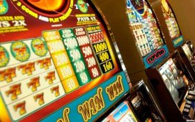 Various live casino game tables showing roulette, blackjack, and baccarat options